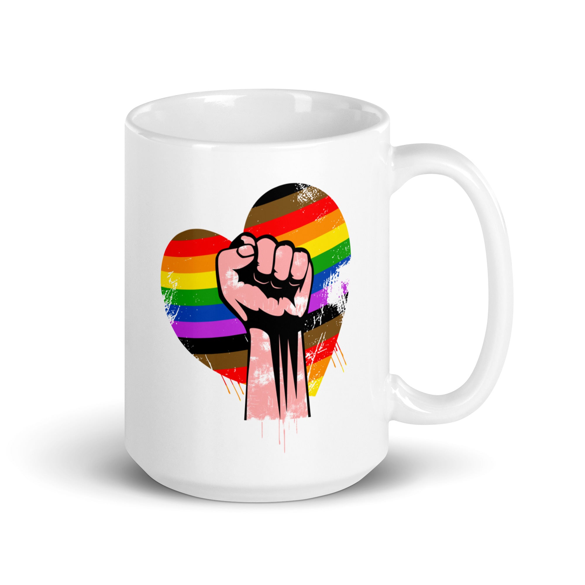 Explore Pridelity's 2025 pride collections with the Fist Mug, a white mug featuring a fist raised in front of a heart decorated with vibrant rainbow and brown colors, symbolizing unity and pride.