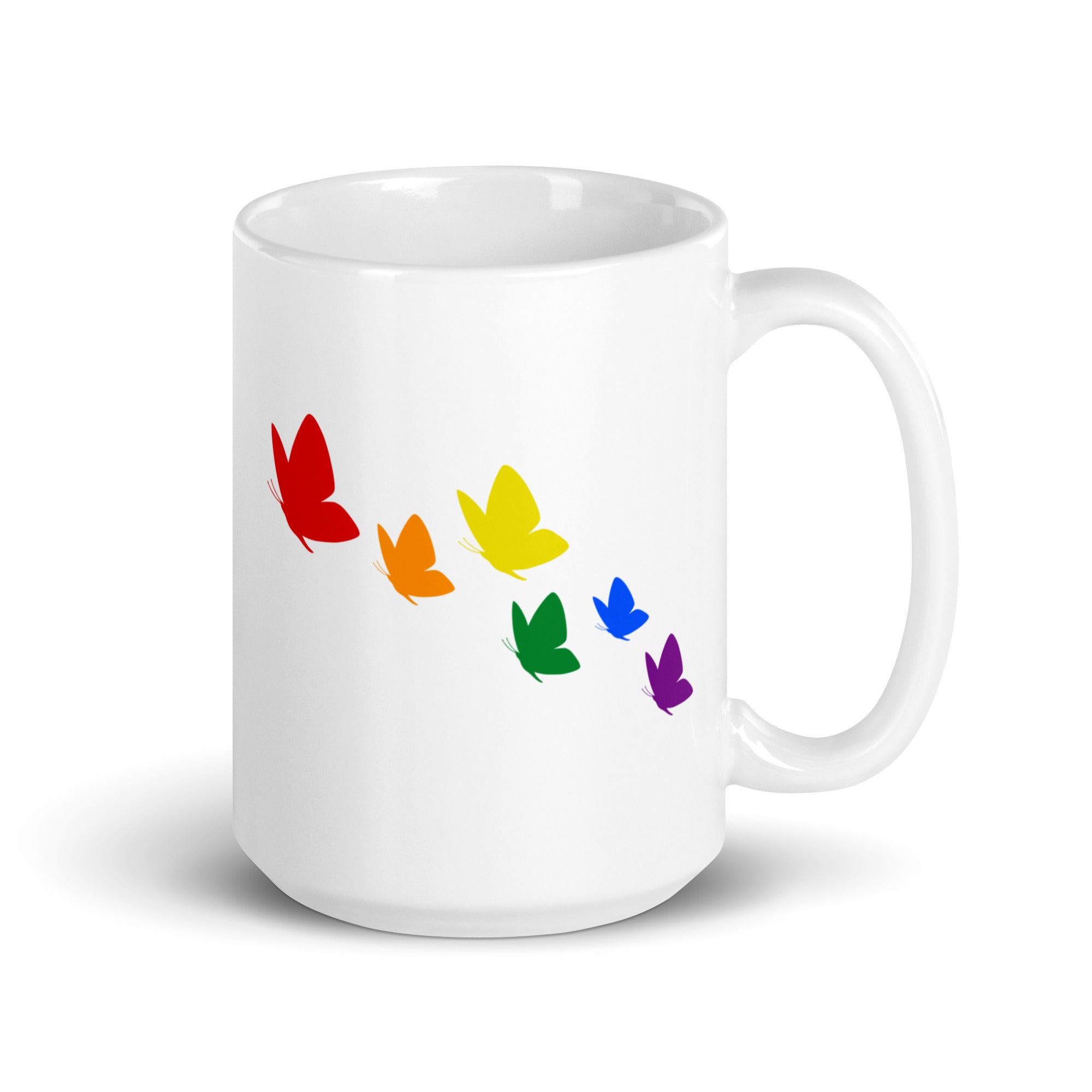 Introducing the Butterflies Mug by Pridelity: A white mug adorned with six vibrant butterflies in a diagonal arrangement. These butterflies showcase a stunning gradient from red to purple, reflecting the colors of the rainbow, making it an ideal addition to your Pride Collection.