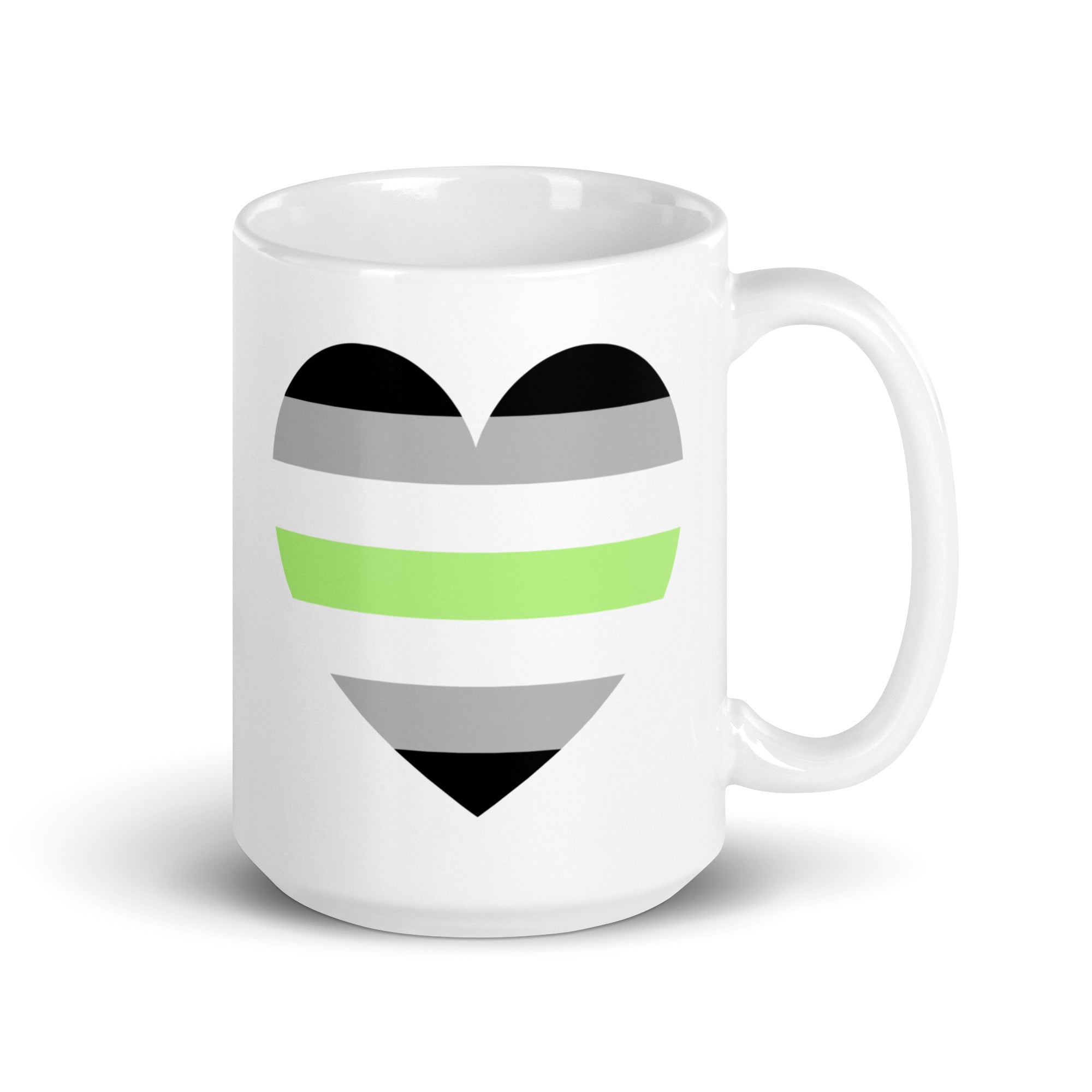 The Agender Heart Mug by Pridelity boasts a charming heart design adorned with black, gray, white, and green stripes that represent the agender pride flag. Safe for use in dishwashers and microwaves, this ceramic mug is available for shipping from Europe and the USA.